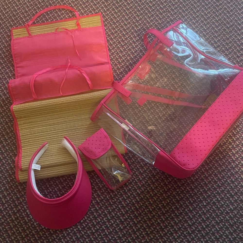 Pink beach bag with visor and cellphone case and mats